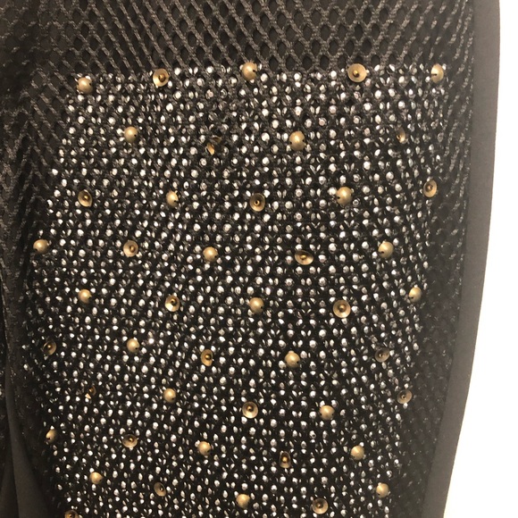 Black leggings with metal detail. - Picture 2 of 4